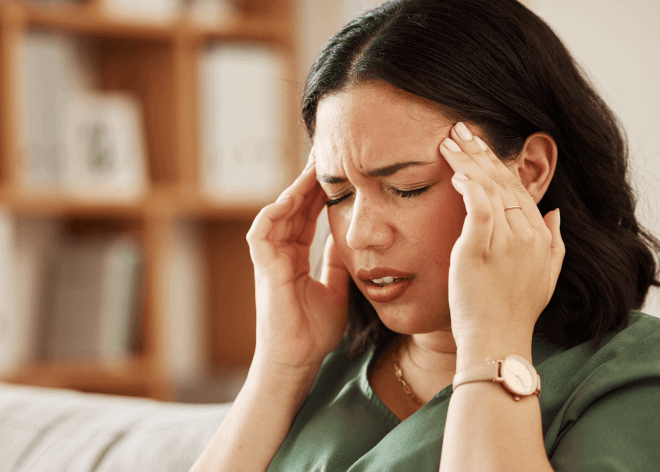 women with a migraine post image